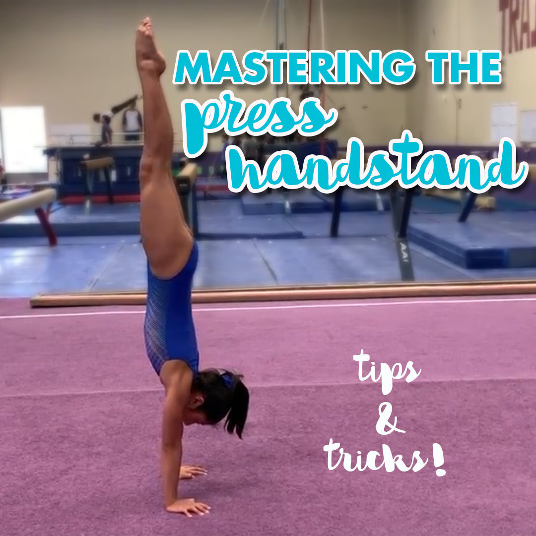 gymnastics beam handstand
