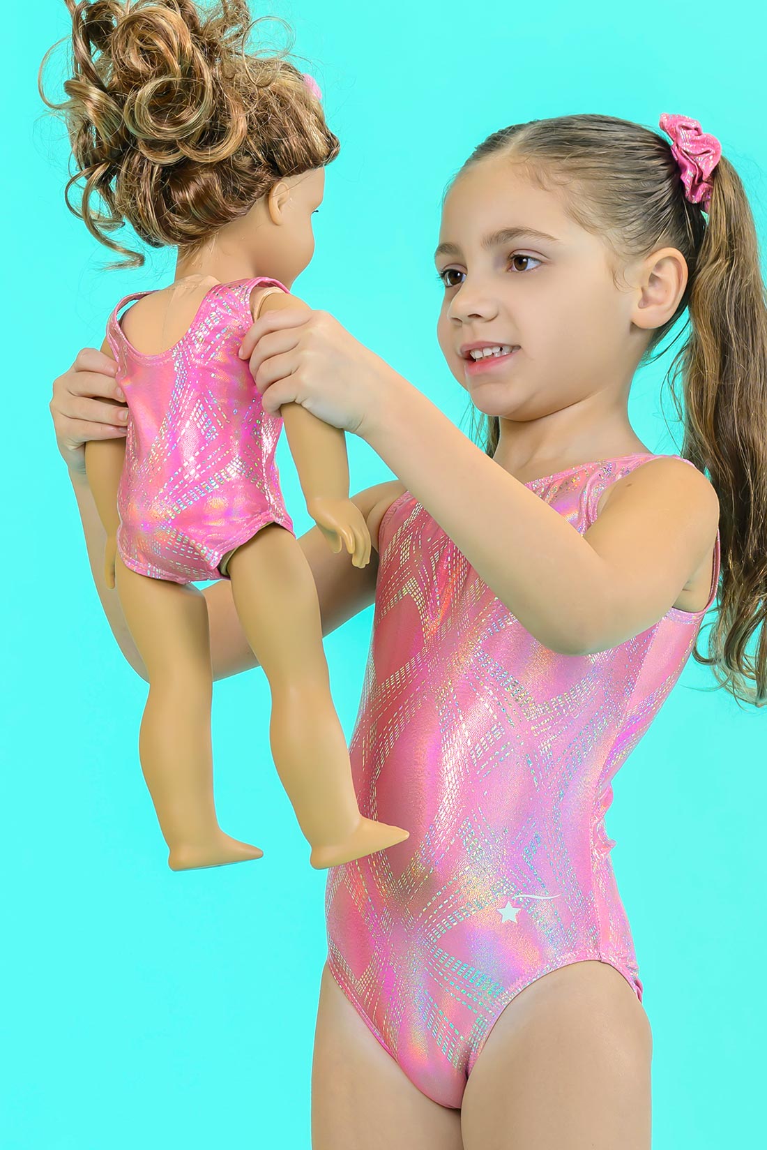 Shimmery gymnastics leotard and matching pink doll leotard by Destira, 2024