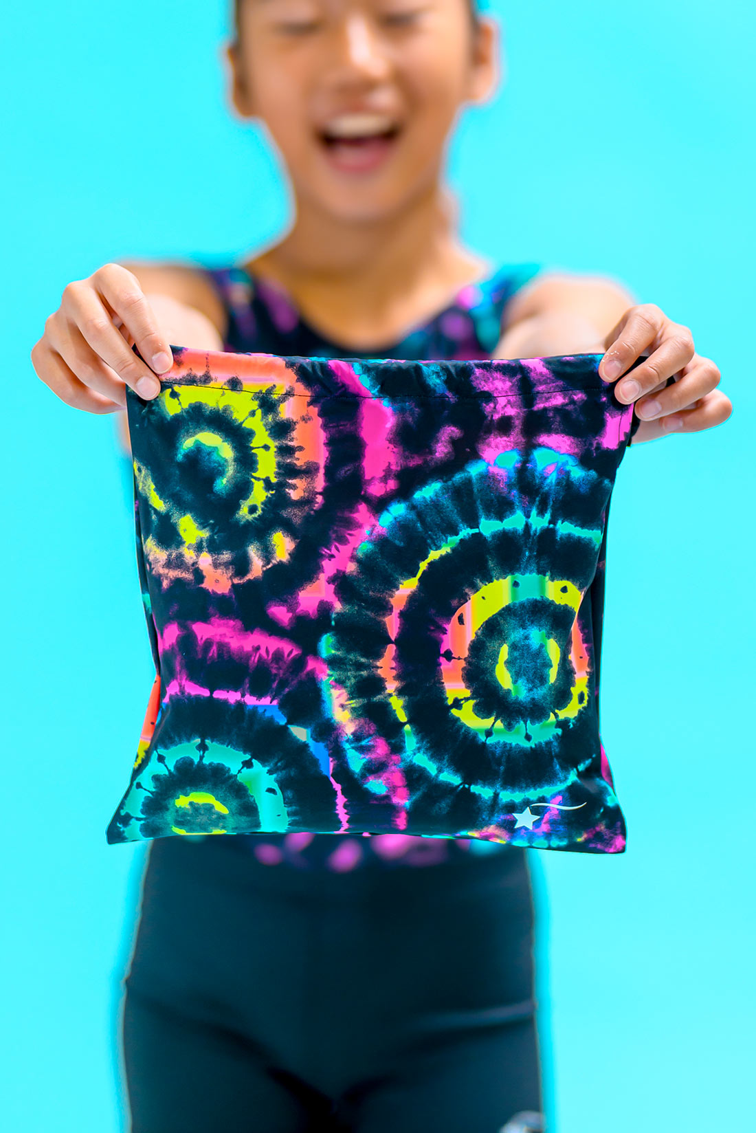 Tie dye grip bag to match leotard and unitard by Destira, 2024