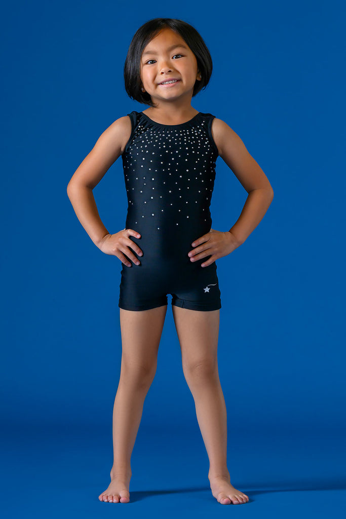 A girl wearing a crystal embellished black unitard for gymnastics by Destira, 2023