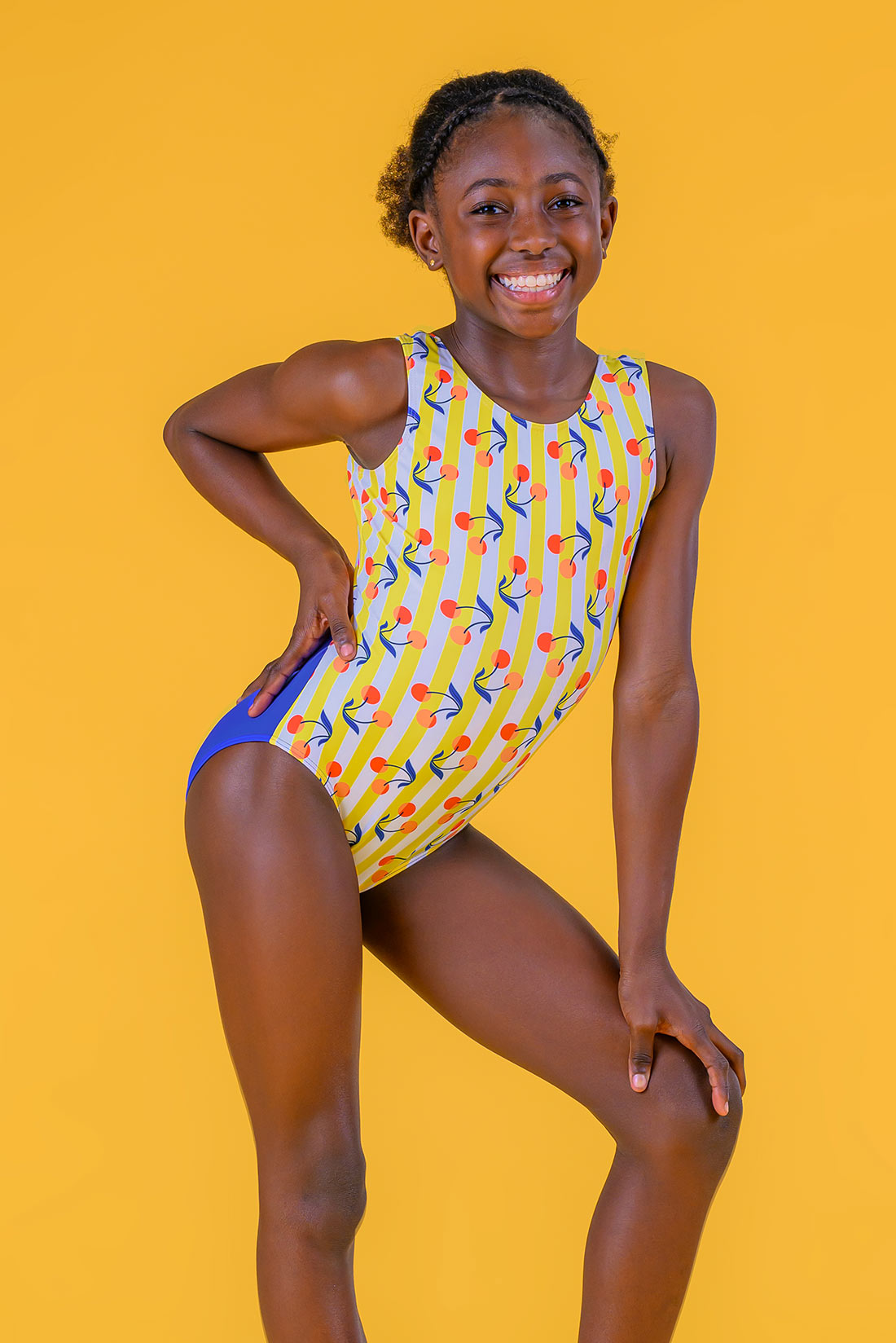 Yellow leotard with fun cherry print by Destira, 2025