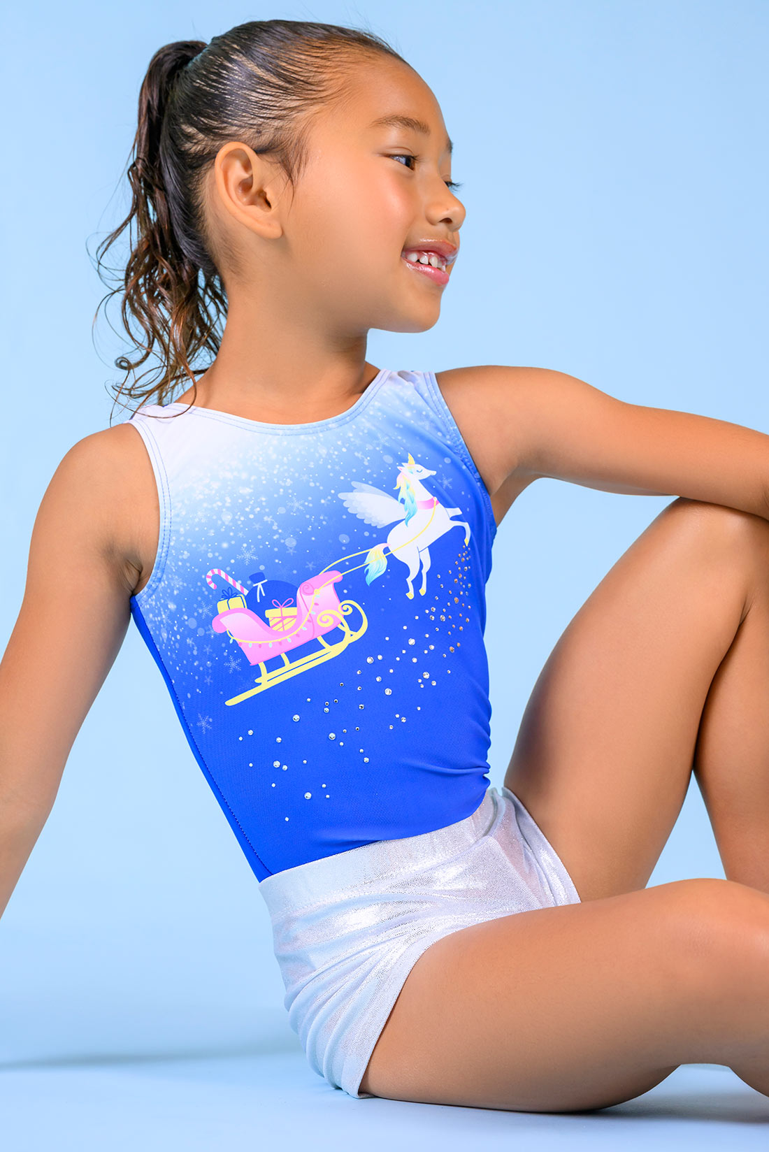 Blue holiday leotard for girls in gymnastics by Destira, 2025