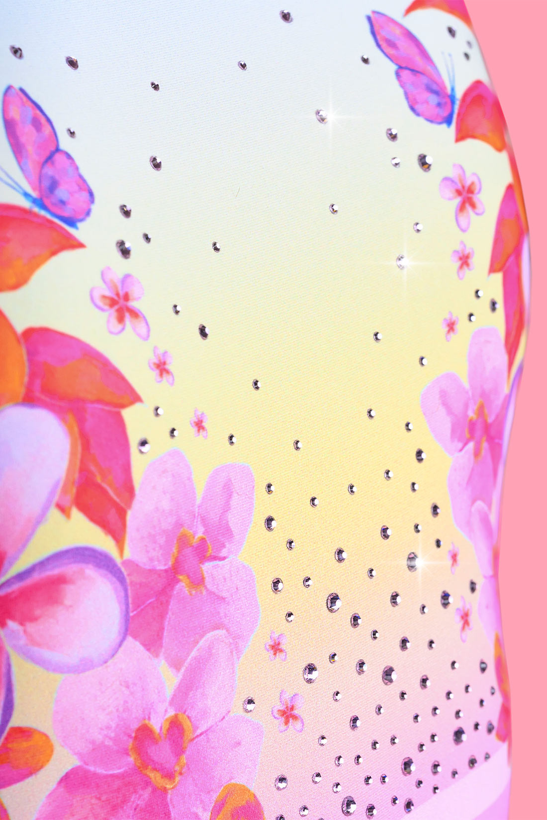 Crystal embellishment on coral leotard by Destira, 2026