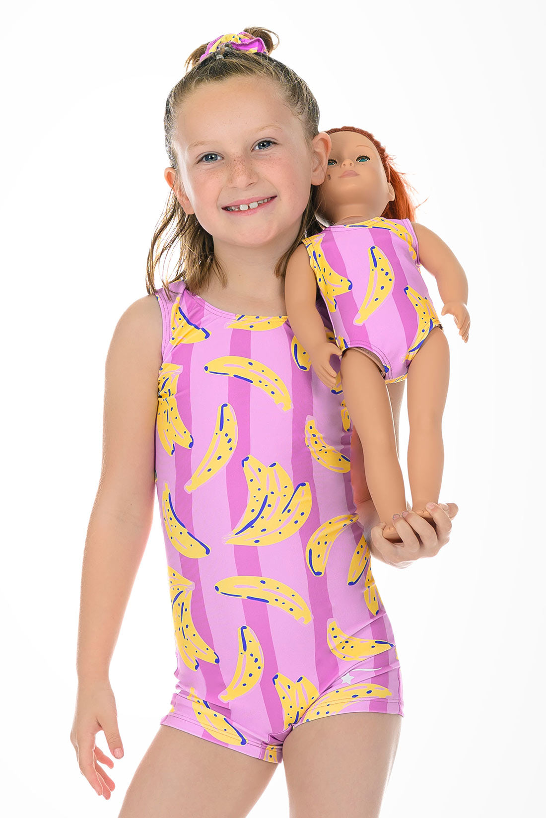 Matching banana unitard and doll leotard by Destira, 2026