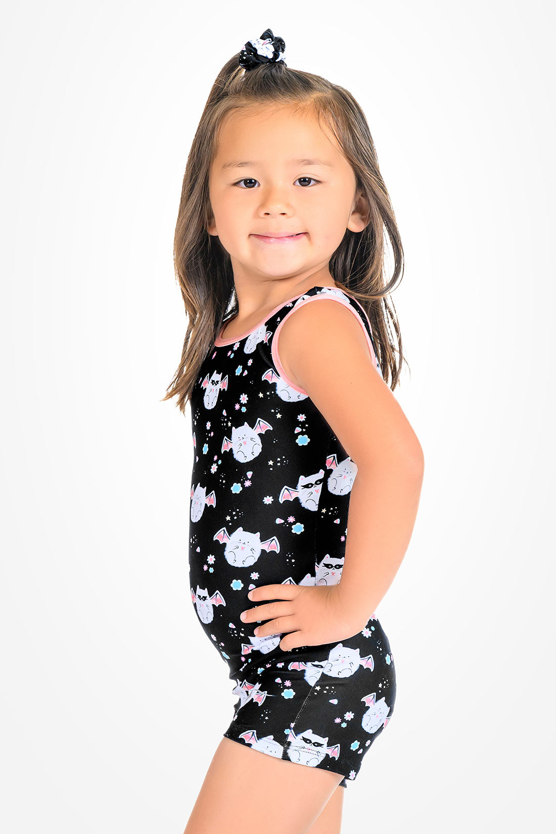 Girls Meowloween cat-themed Halloween gymnastics unitard - side shot