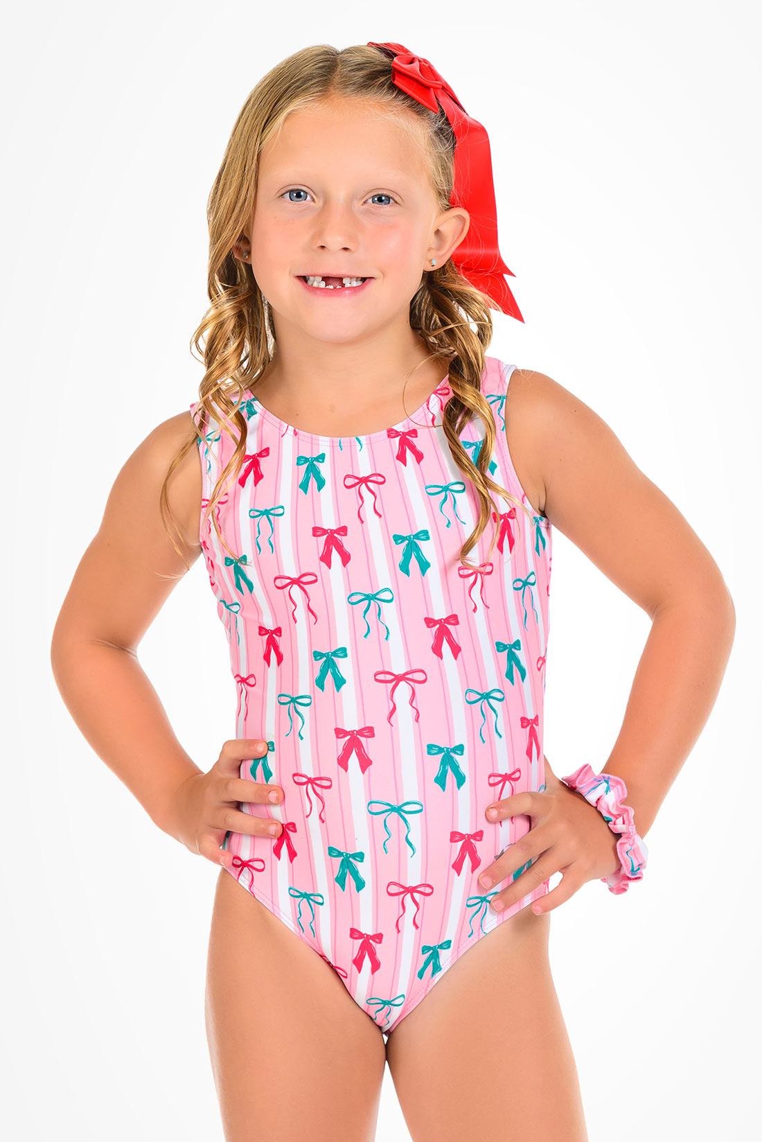 Pink and white practice leotard with bows by Destira, 2026