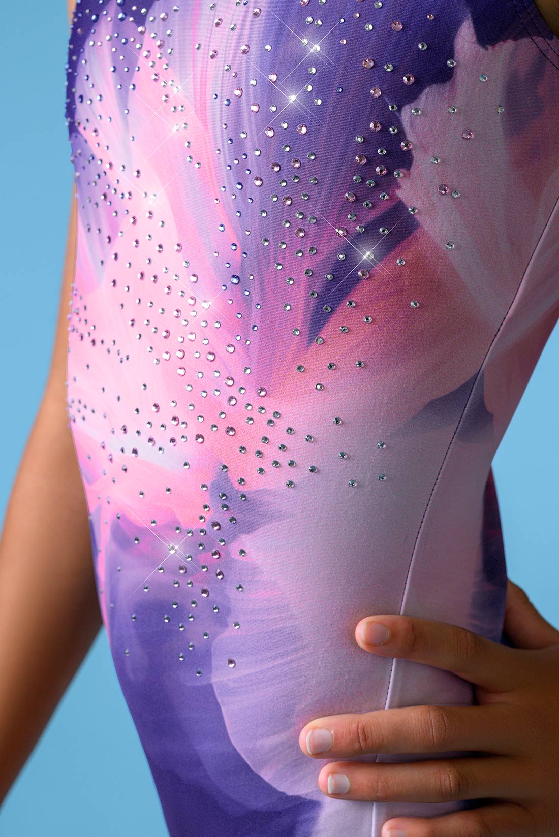 Sparkle detail on purple leotard by Destira, 2026
