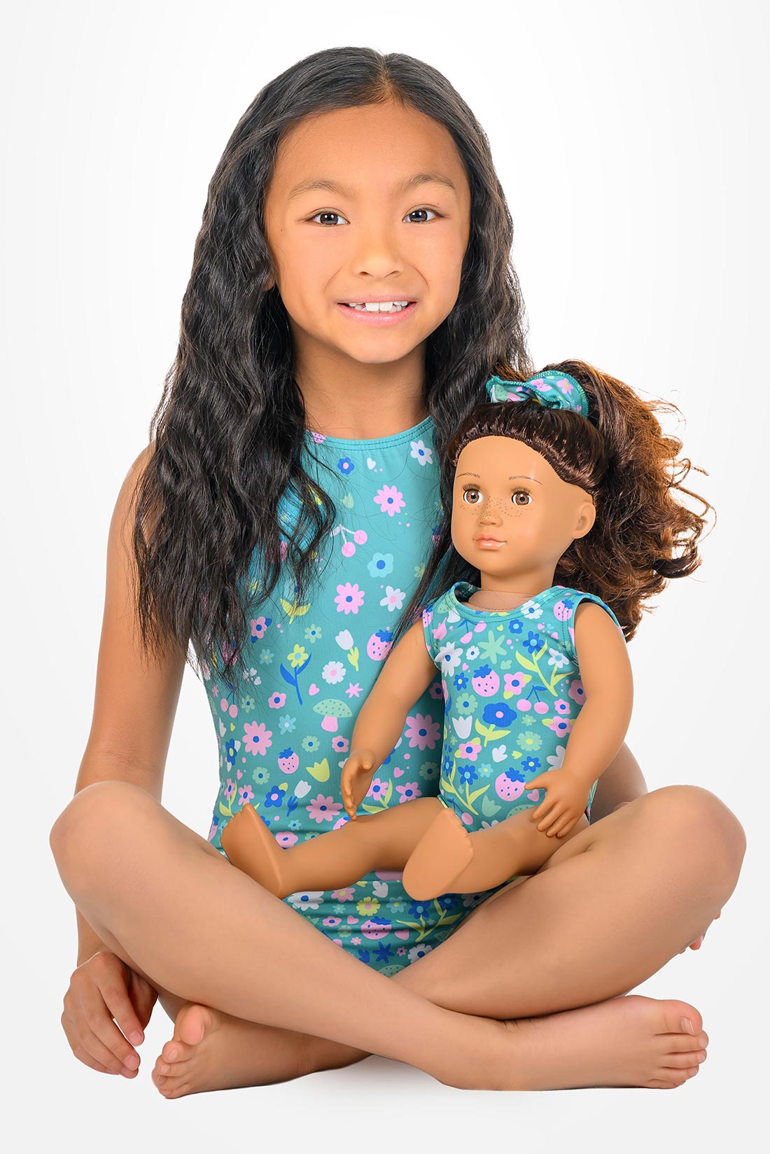 Matching blue leotard for girls and their dolls by Destira, 2026