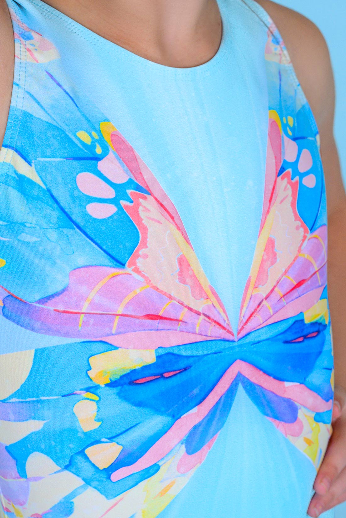 Colorful butterfly detail on leotard by Destira, 2026
