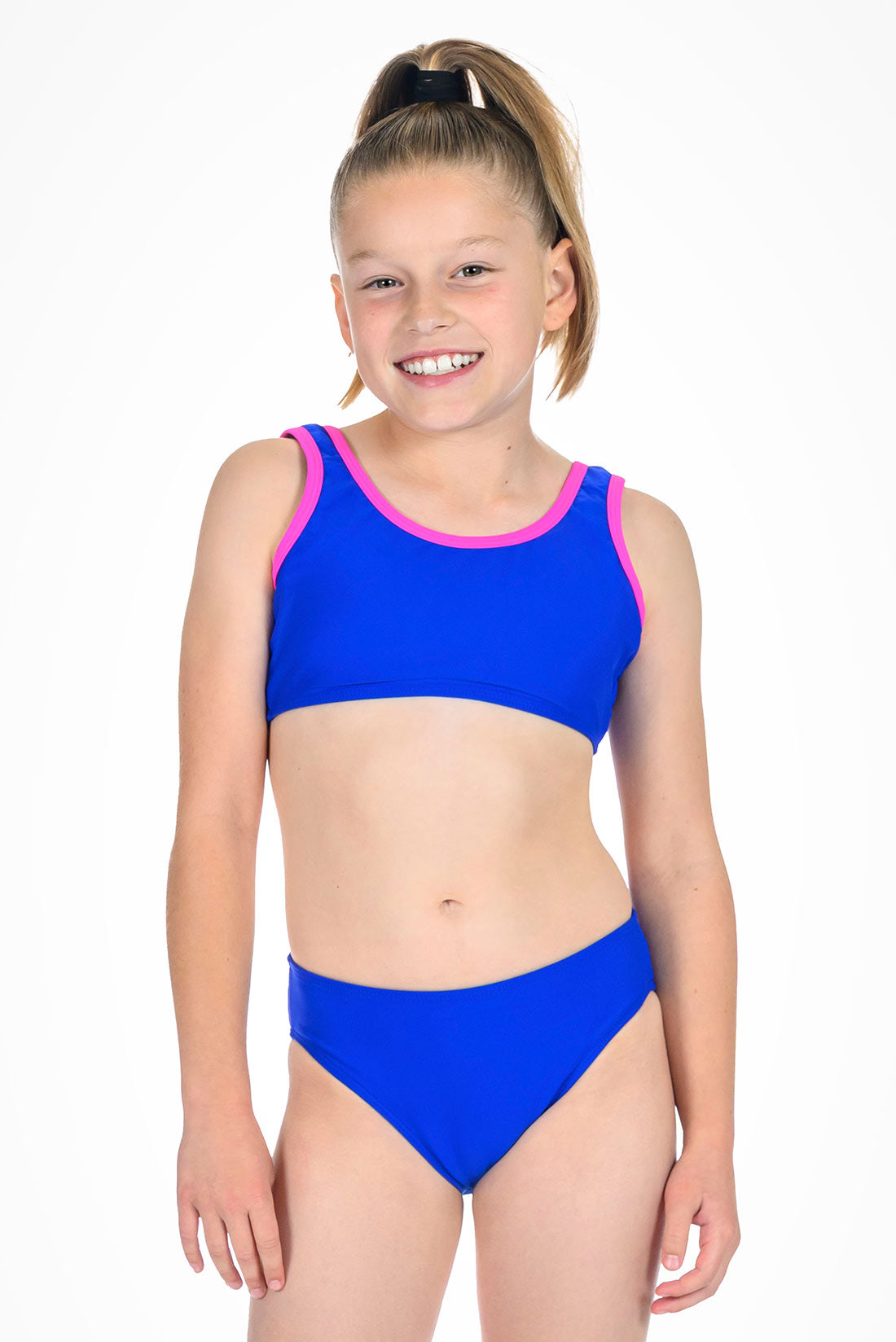 Young girl wearing a blue bikini with pink trim on a white background showing front view