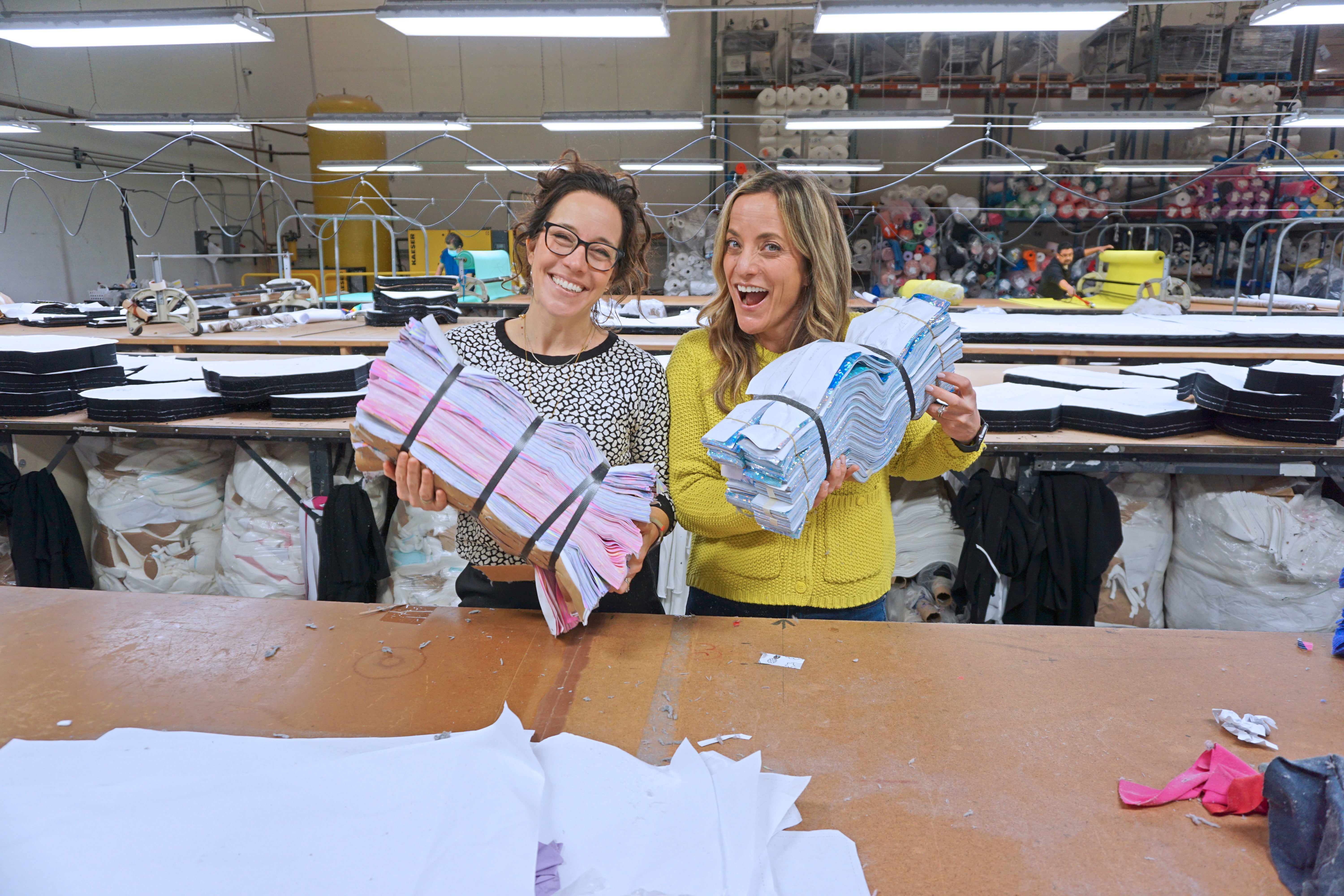 Co-CEOs prepping scrunchies to be sewn from excess Destira fabric, 2025