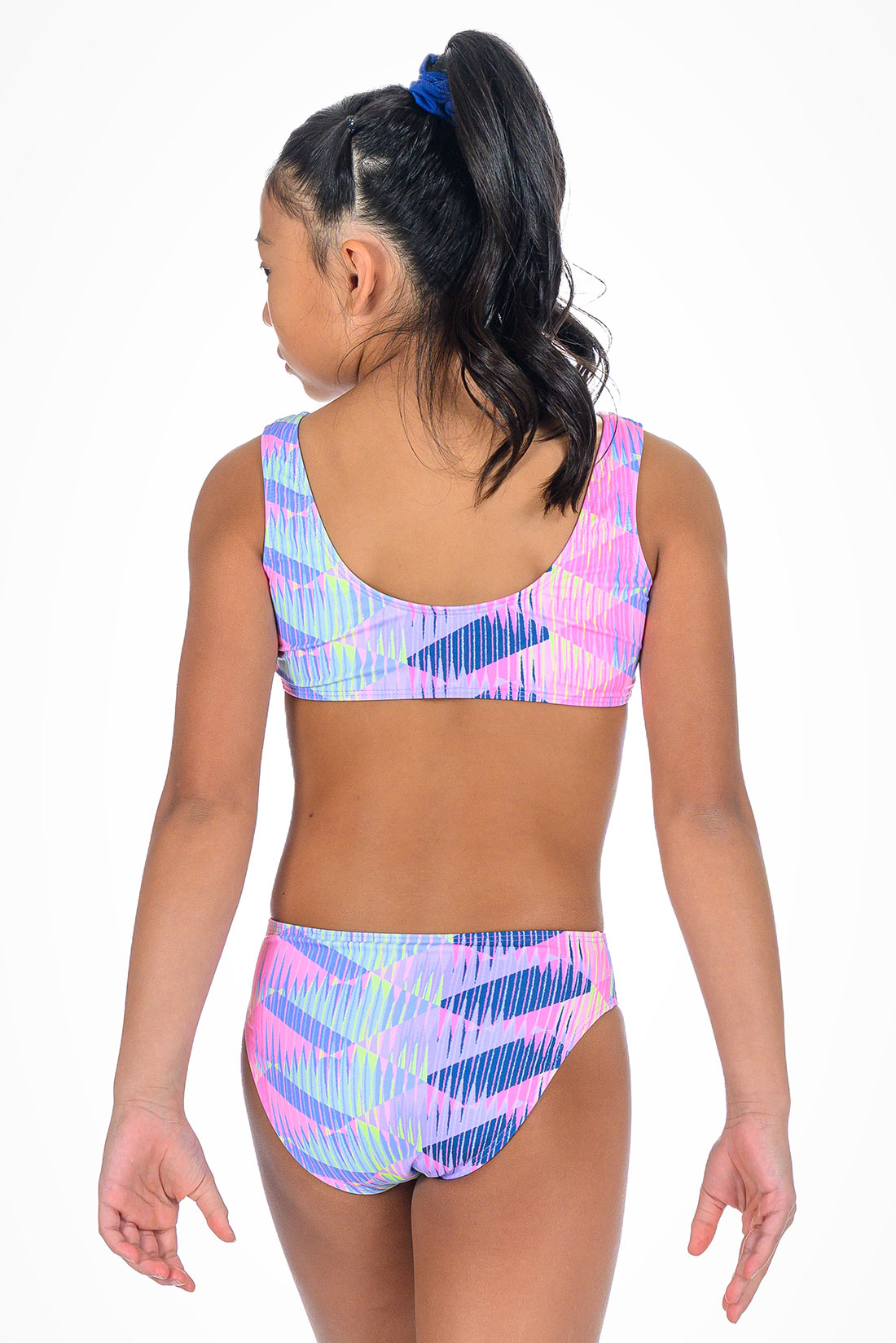Girl wearing a colorful bikini set on a white background showing back view