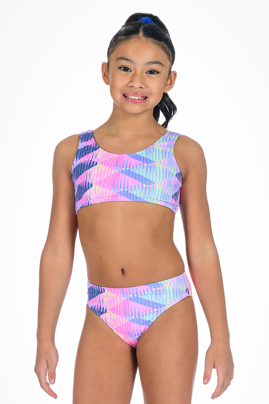 Young girl wearing a colorful bikini with a geometric pattern showing front view