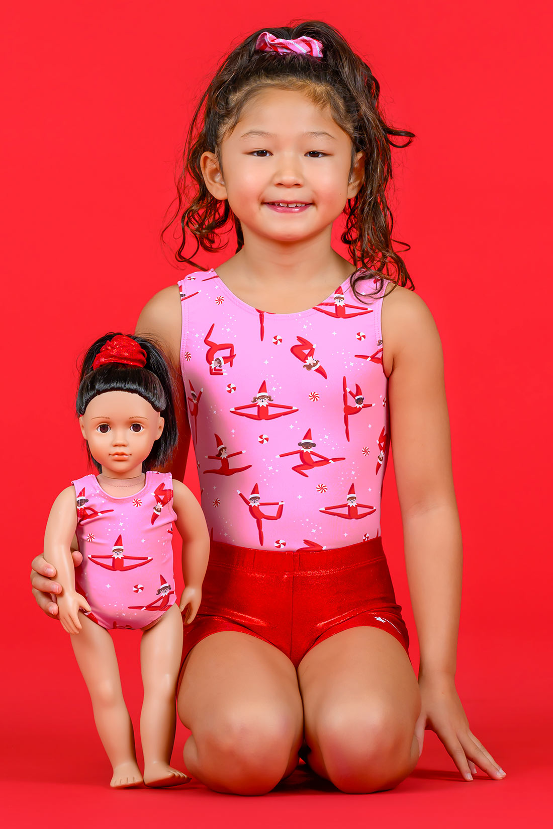 Pink holiday leotard and matching doll leotard by Destira, 2024